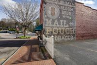 this old store sign painted on the side of a brick building in new hampshire, kentucky