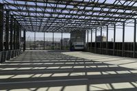 metal structure with sunlight in a building area on sunny day, including floor tileing