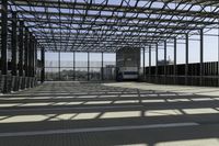 metal structure with sunlight in a building area on sunny day, including floor tileing