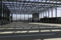 metal structure with sunlight in a building area on sunny day, including floor tileing