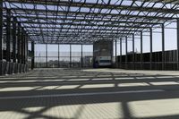 metal structure with sunlight in a building area on sunny day, including floor tileing