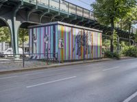 the city has two street murals on it, both one with a lady in a bikini