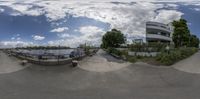 the circular view photo is taken on a skateboarder as he performs a trick