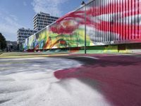 the large building is designed to look like it has been painted with spray paint on the side