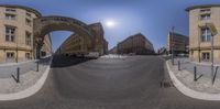 an image of a street taken on a fish eye lens with the lens panoramically