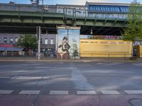 a mural painted on side of the street with a man and women riding on horseback