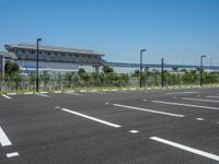 Urban City: Asphalt and Parking Lot Under a Clear Sky