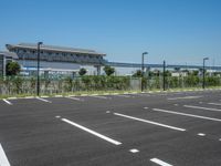 Urban City: Asphalt and Parking Lot Under a Clear Sky