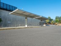 Urban City: Concrete Walls, Road, and Lush Vegetation