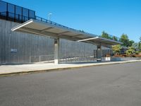 Urban City: Concrete Walls, Road, and Lush Vegetation