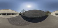 this is an image of a fish eye view of a building in the sun and moon