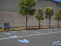 empty road with white lines on the streets of city area against cloudy blue sky on a sunny day