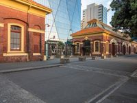 the city streets are empty in this photo, which appears to be an outdoor shopping district