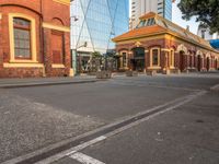 the city streets are empty in this photo, which appears to be an outdoor shopping district