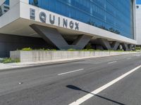 a large, tall building that has a sign on the outside of it saying equinex