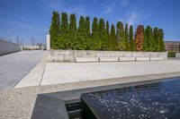 Urban City: Reflections in Water and Clouds