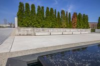 Urban City: Reflections in Water and Clouds