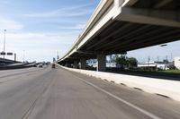 Urban city road with asphalt and concrete bridge in Houston, Texas, USA