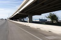 Urban city road with asphalt and concrete bridge in Houston, Texas, USA