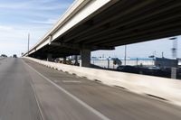 Urban city road with asphalt and concrete bridge in Houston, Texas, USA