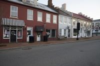 Urban Cityscape: Brick Wall and Asphalt Road