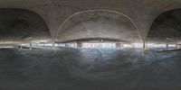 a view of a skateboard ramp through the air tunnel on a skateboarding course