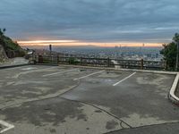 Urban Cityscape at Dawn with Views of Parking Lot and Water