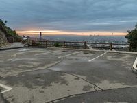 Urban Cityscape at Dawn with Views of Parking Lot and Water