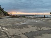 Urban Cityscape at Dawn with Views of Parking Lot and Water