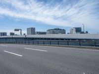 Urban Cityscape of Japan: Daytime Views with Clouds and Bridges