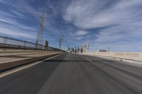 the view of a freeway highway from inside a vehicle driving in the foreground is blurredry