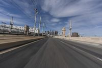 the view of a freeway highway from inside a vehicle driving in the foreground is blurredry