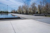 Urban Cityscape with Tall Buildings, Roads, and Trees