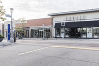 this is an image of a commercial area in a city area at the intersection of the street