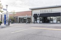 this is an image of a commercial area in a city area at the intersection of the street