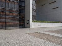 Urban Concrete Wall in Berlin with Gravel and Dirt