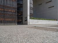 Urban Concrete Wall in Berlin with Gravel and Dirt