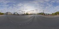 the panorama of the road with its curves in it with no people around the corner