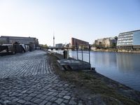 Urban Design in Berlin: Cobblestone Flooring and Courtyard Overlooking the River