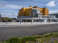 an urban park that looks similar to a modern building in its native country surroundings with grass