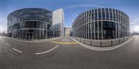 a couple of distorted photos sitting on top of a street street, taken from behind