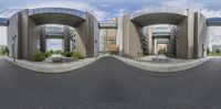 three circular photos of an urban street and buildings with a paved street in front of them