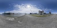 a 360 - fish - eye photograph of a view of a large building in the city