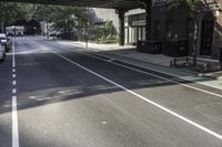 Urban Design with Buildings and Trees on Asphalt Road