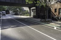 Urban Design with Buildings and Trees on Asphalt Road