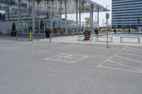 a parking lot with an outside area next to it and an area in the background