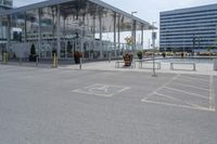 a parking lot with an outside area next to it and an area in the background