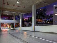 there is no image here to provide a caption for this image above, as this is a parking garage with cars parked in it