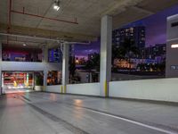 there is no image here to provide a caption for this image above, as this is a parking garage with cars parked in it