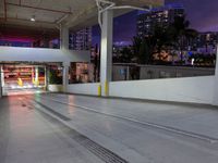 there is no image here to provide a caption for this image above, as this is a parking garage with cars parked in it